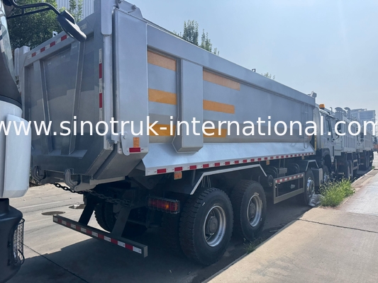 SINOTRUK HOWO 371HP 8X4 Carrinho de descarga de descarga Construção Antiga Frente Frente Militar Para áreas de mineração Duas luzes de aviso Container tipo U