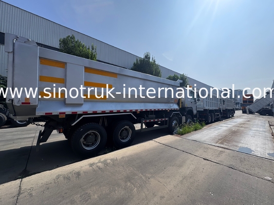 SINOTRUK HOWO 371HP 8X4 Carrinho de descarga de descarga Construção Antiga Frente Frente Militar Para áreas de mineração Duas luzes de aviso Container tipo U