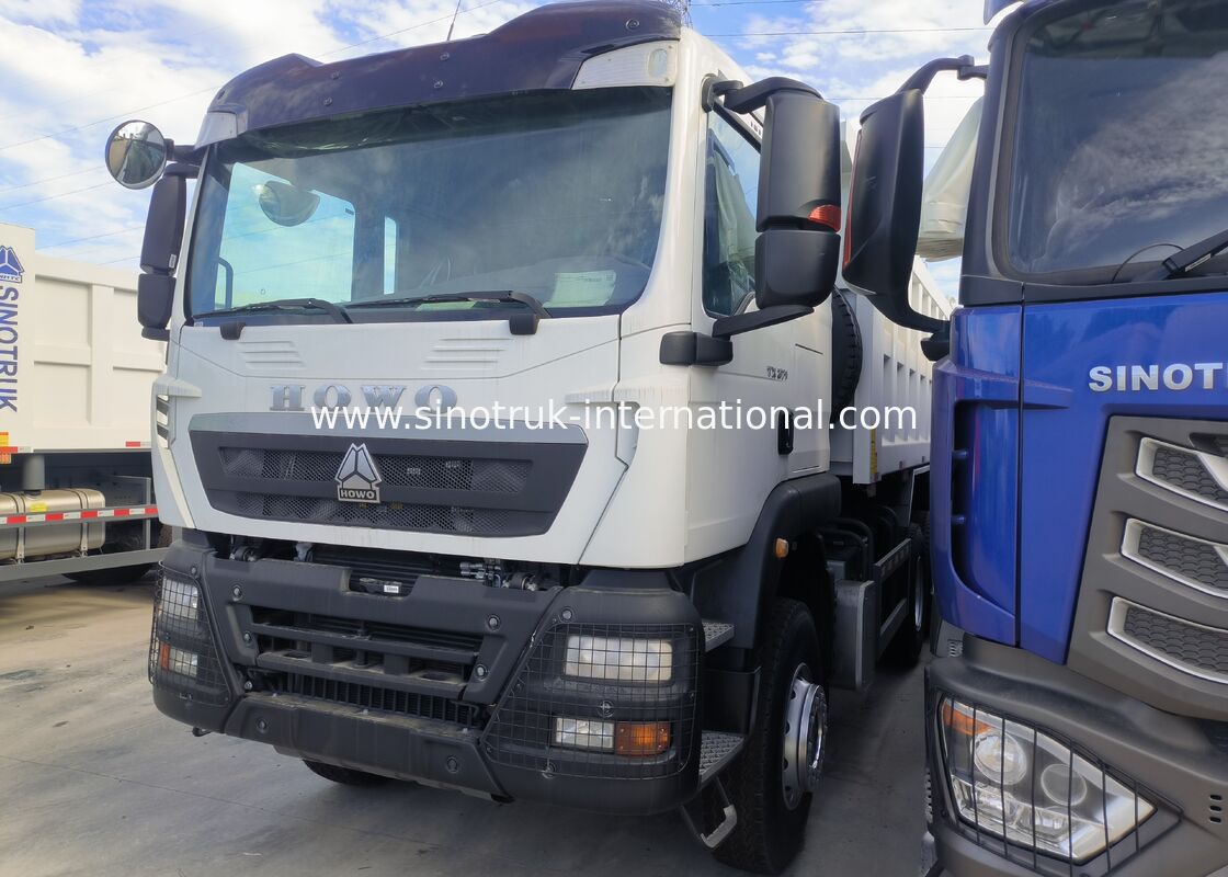 Caminhão de descarga de cargas pesadas a diesel que fornece tração e estabilidade superiores para as necessidades de transporte de materiais pesados
